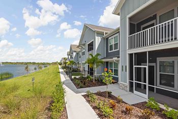 A row of houses with a walkway in between.